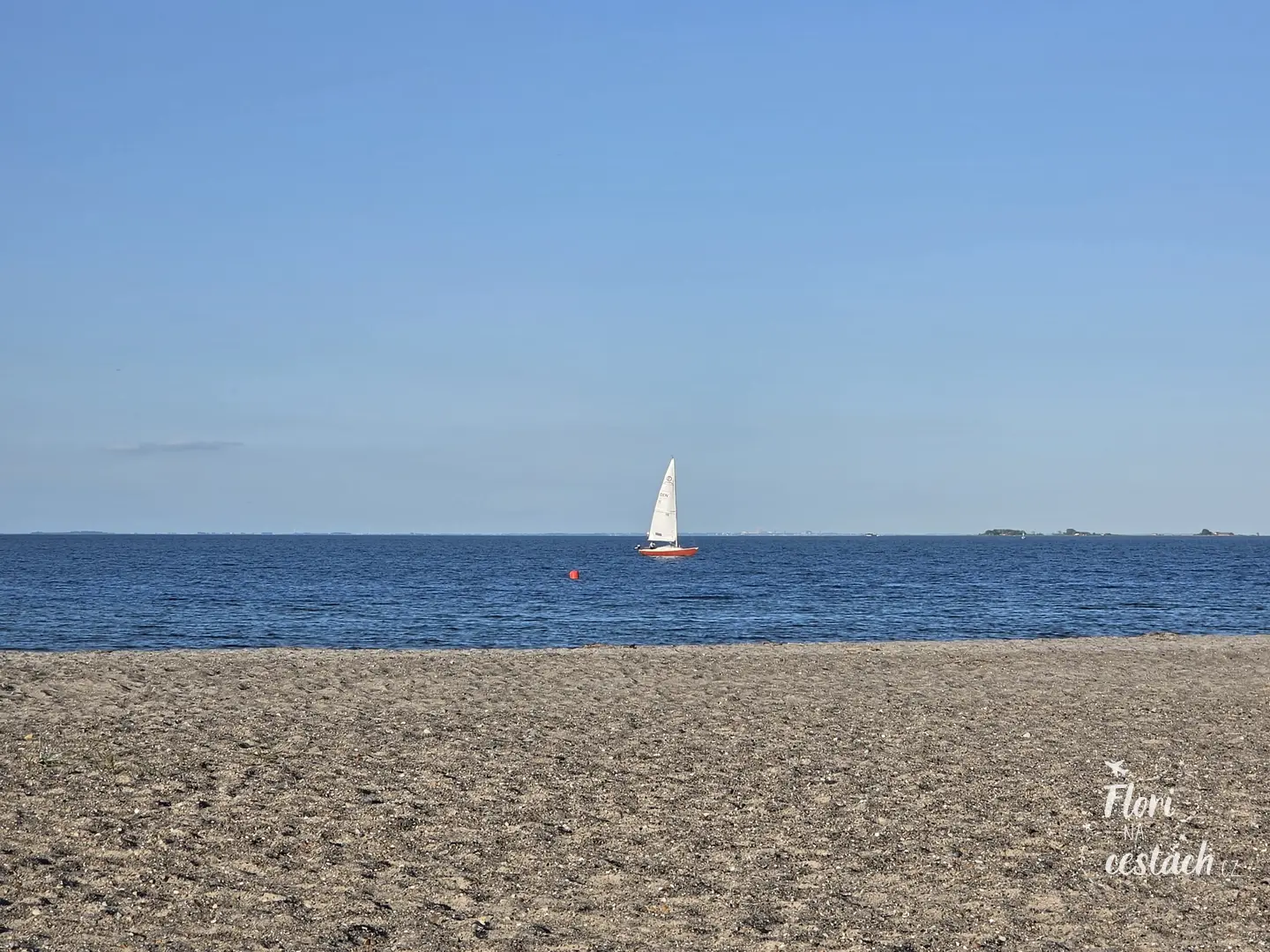 Odpočinek na písečné pláži Amager Strandpark v Kodani.
